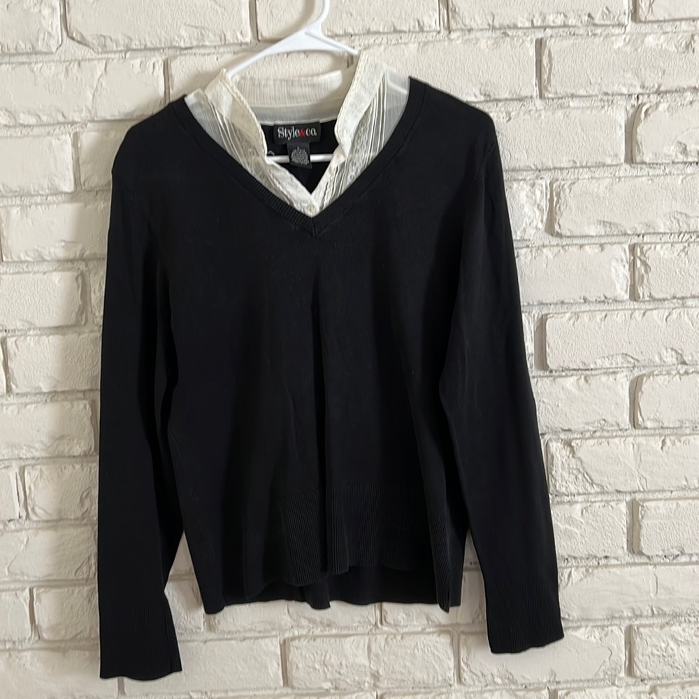 Black sweater with faux cream blouse
